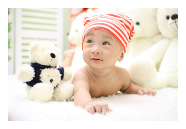 Baby With Orange Cap  Wall Art